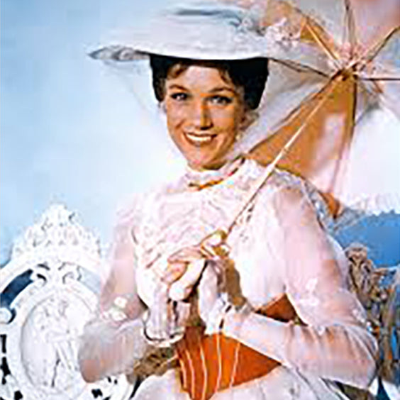 Mary Poppins dresses elegantly in white with a parasol