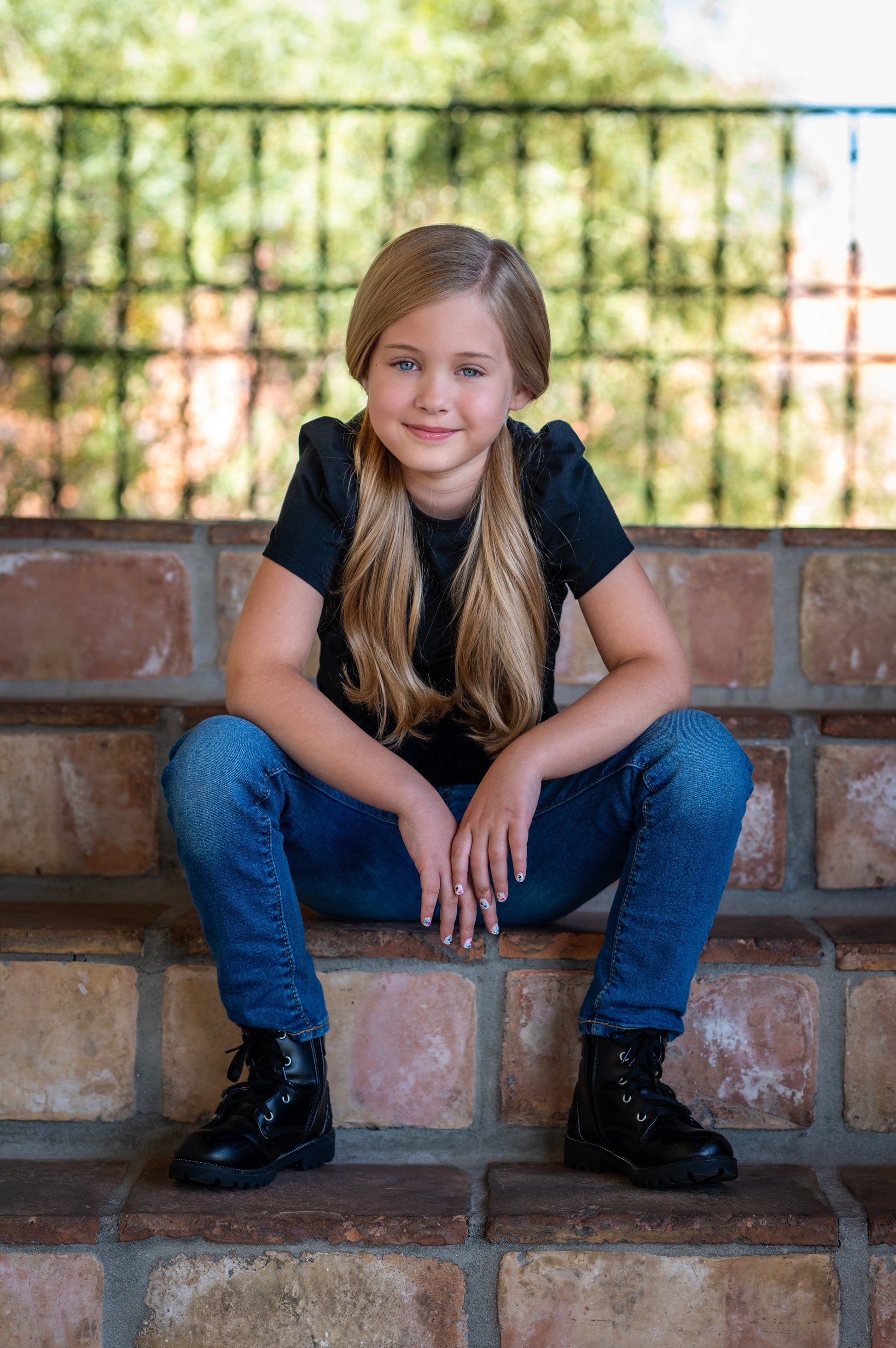 Girl wearing our back short sleeve t-shirt